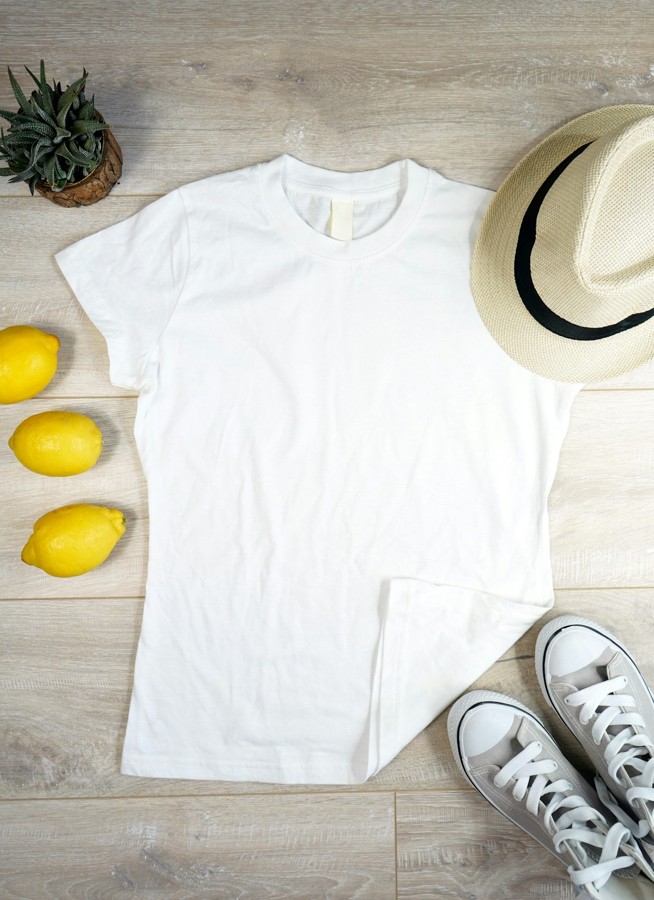 Sample stock photo of a blank white t-shirt laid flat