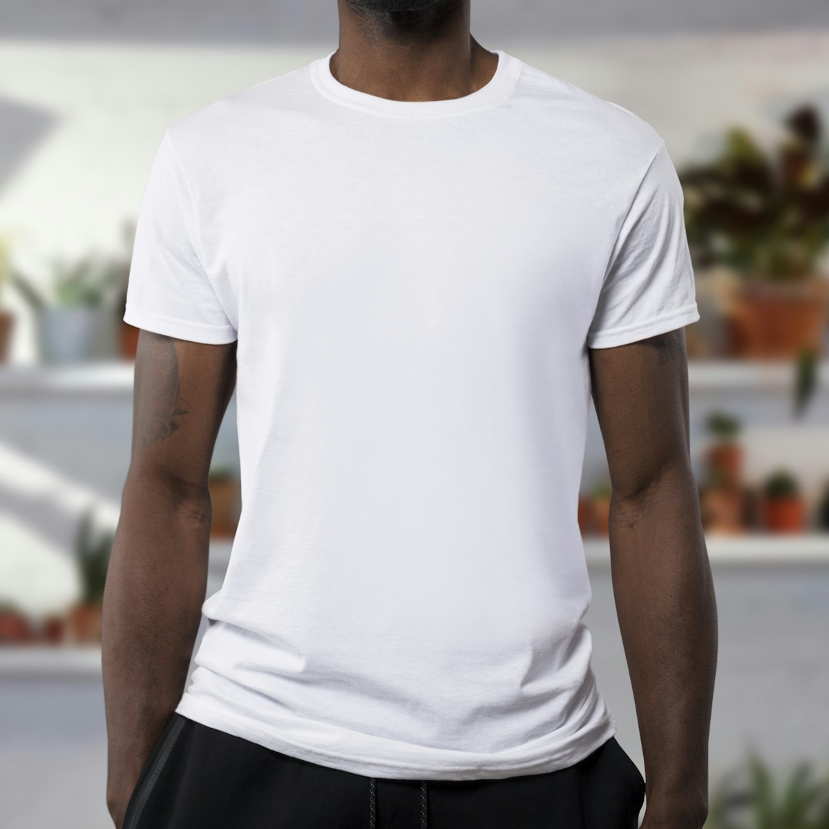 Sample stock photo of a plain white cotton t-shirt